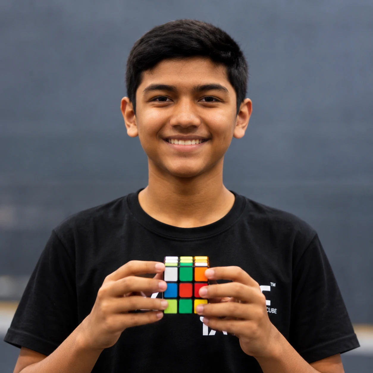 Vihaan J. holding a 3x3 cube