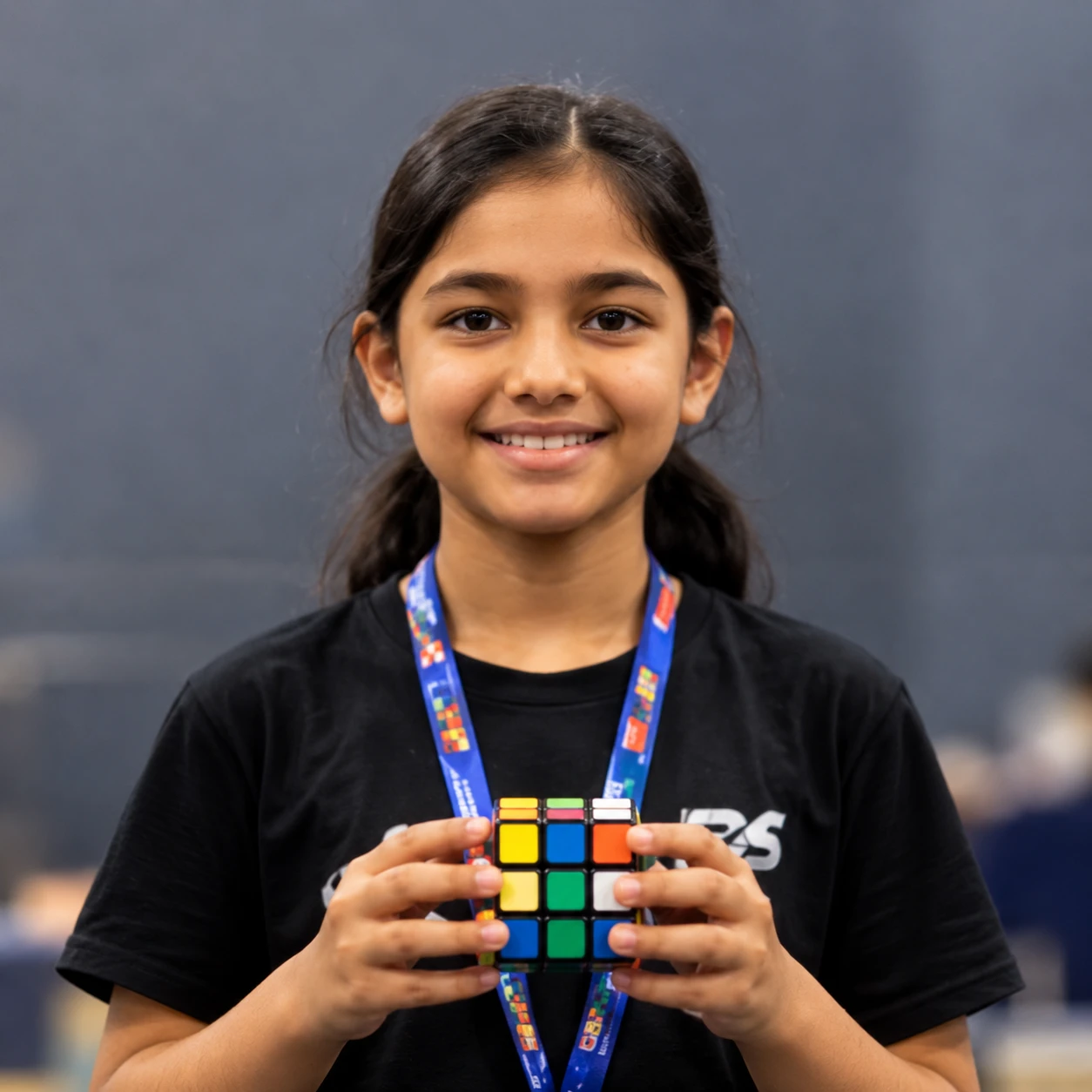 Siya M. holding a cube